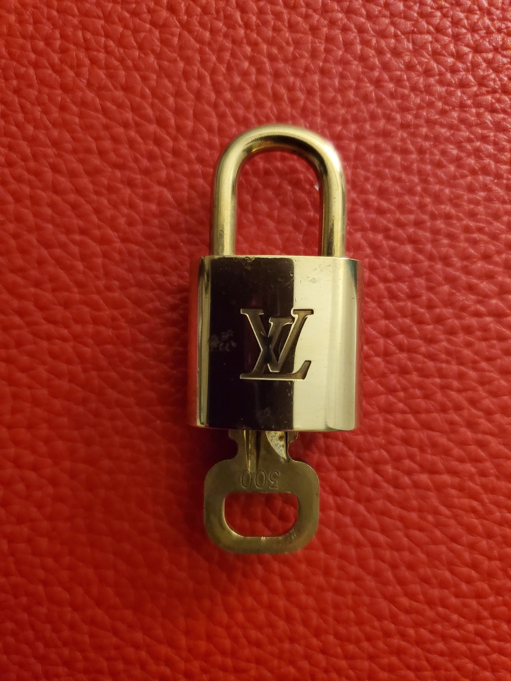 Louis Vuitton Gold Padlock with Key - Gold